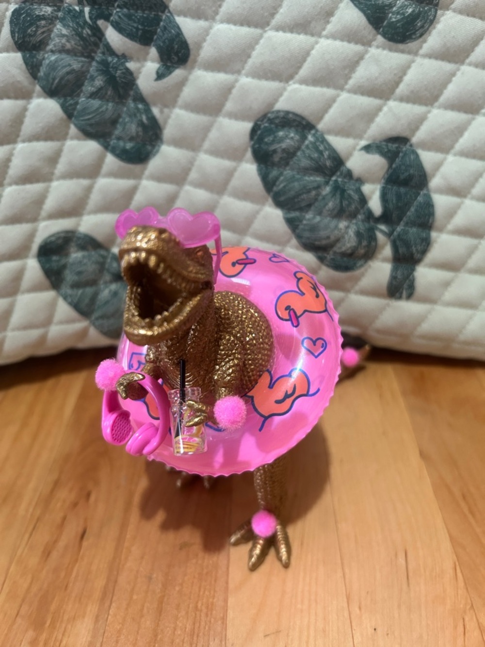 Upcycled beach dinosaur figurine